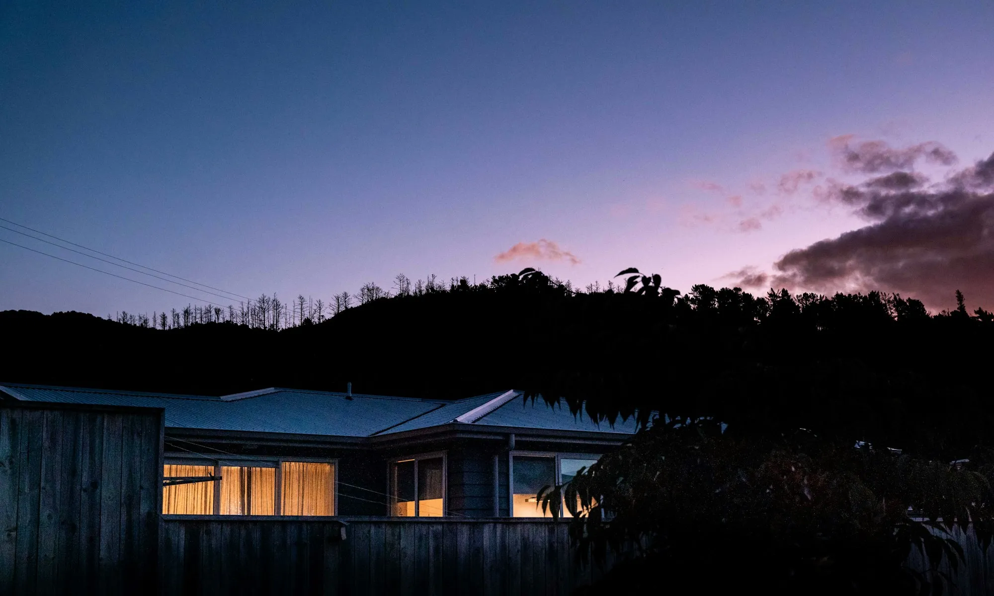 The house on the ridge at dusk