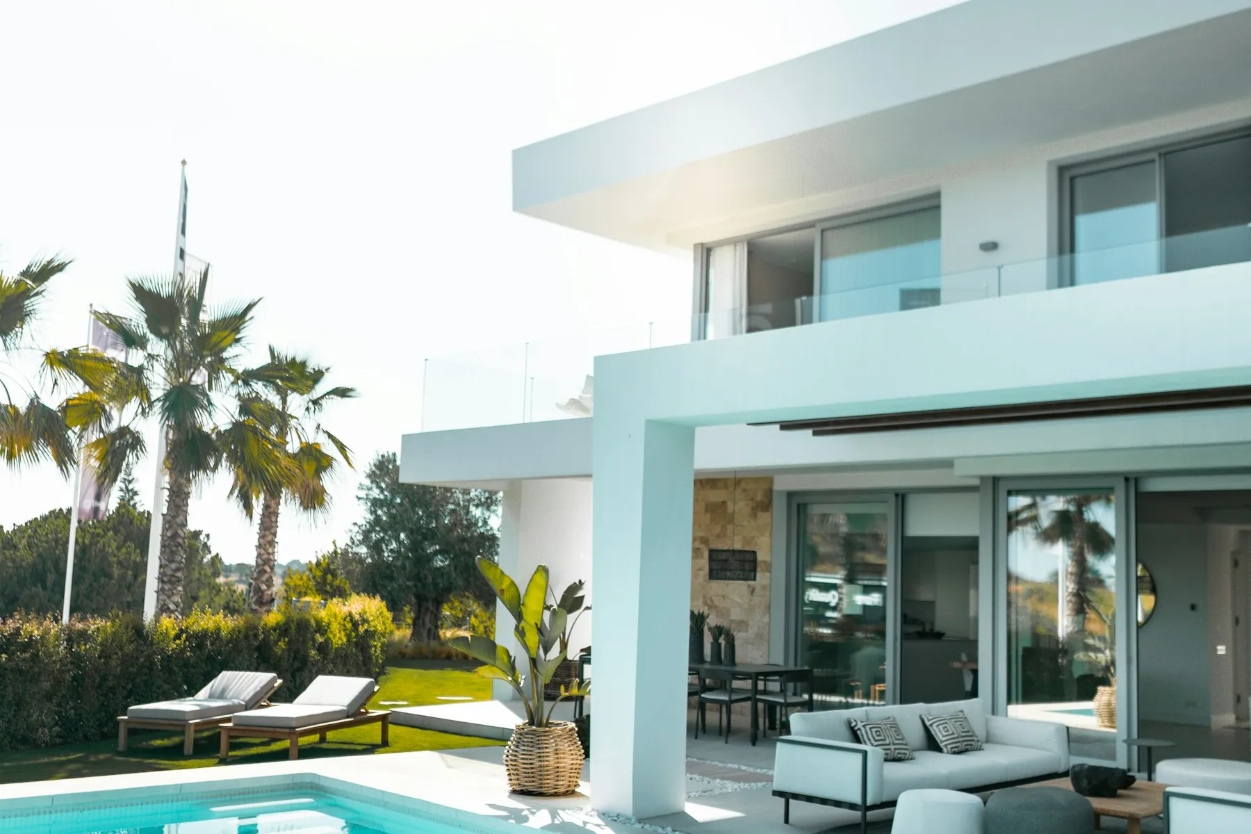 The house and pool above the highway